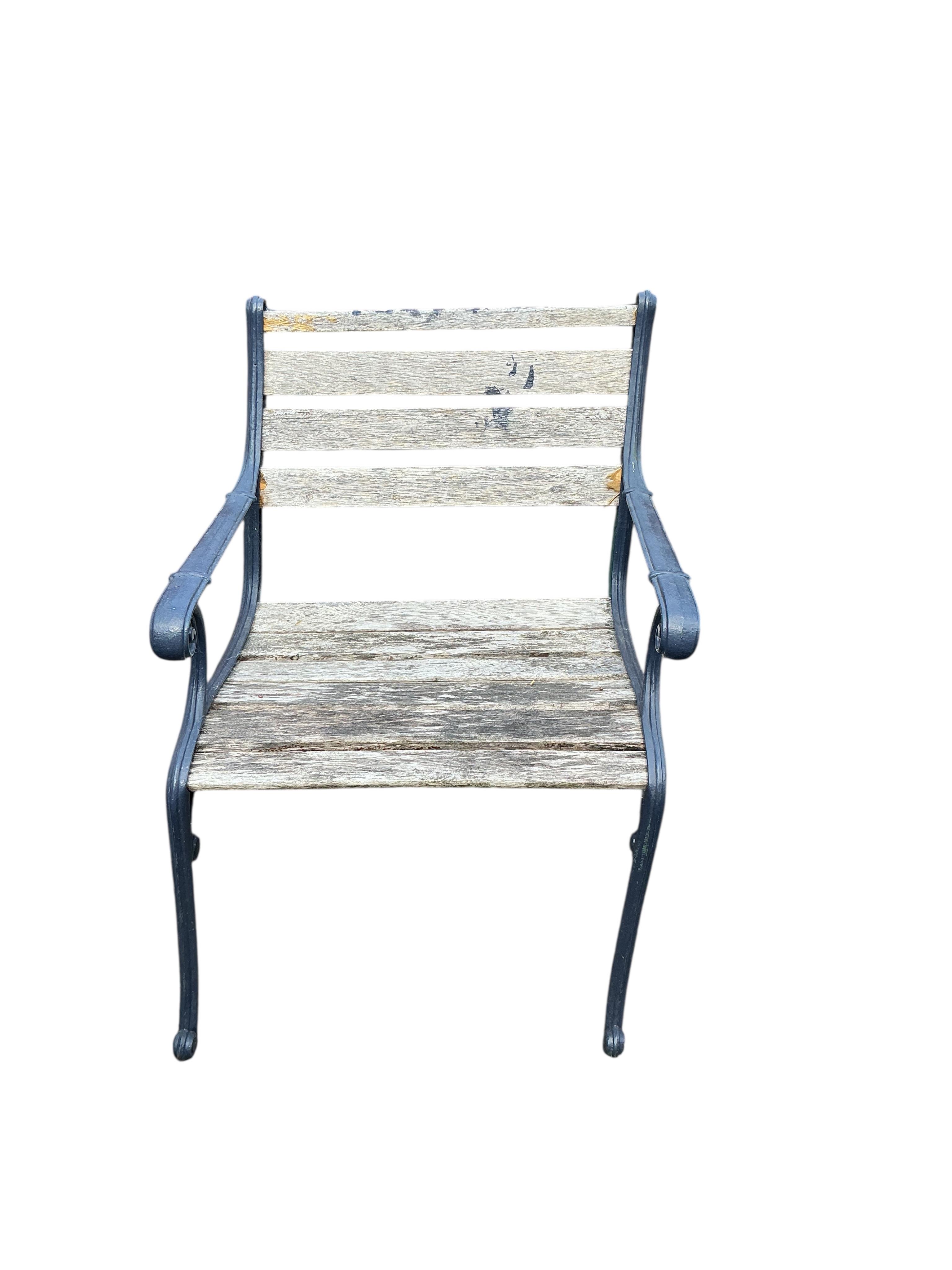 A cast metal slatted garden bench, width 115cm, together with three matching garden armchairs and four bench ends